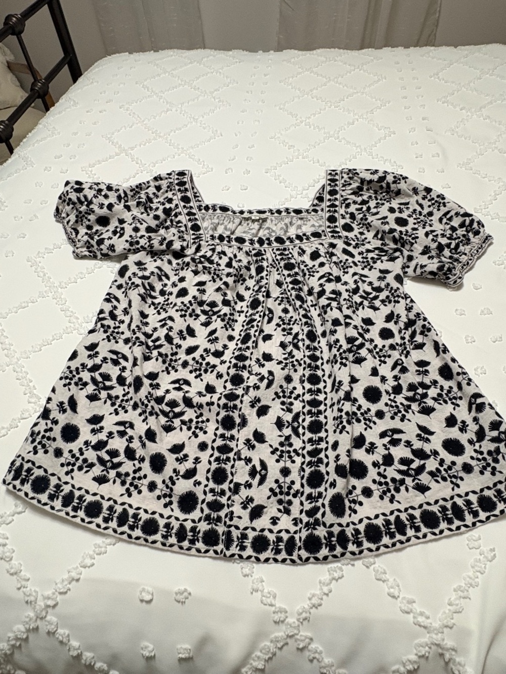 White blouse with black design